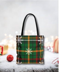 Winter Whispers Plaid Tote Bag - Front view of the classic green plaid design with delicate snowflakes.